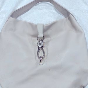 Large off white Dooney & Burke shoulder bag.